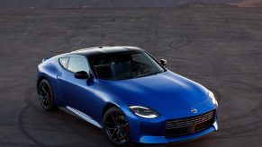 An overhead view of a blue 2023 Nissan Z on a canyon-side parking space