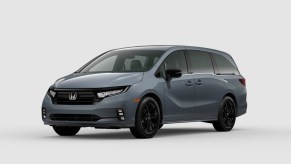 Sonic Grey 2023 Honda Odyssey Sport minivan brand spec shot