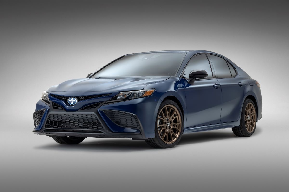 The 2023 Toyota Camry SE Nightshade Special Edition midsize sedan in Reservoir Blue, a new exterior color
