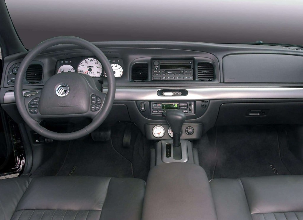 The black-leather front seats and black dashboard of a 2003 Mercury Marauder