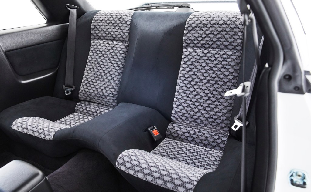 The black-Alcantara-trimmed rear seats with Mt. Fuji inserts in a Built by Legends Mine's R32 Nissan Skyline GT-R