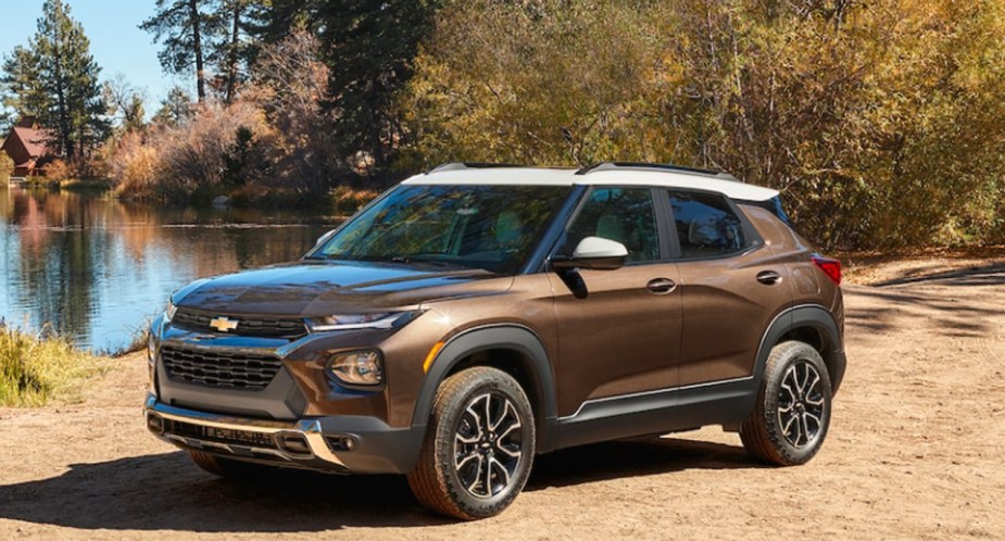 A brown 2022 Chevy Trailblazer against a background of trees.