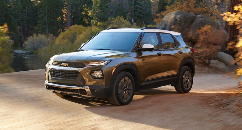 A brown 2022 Chevy Trailblazer small SUV is driving off-road. 