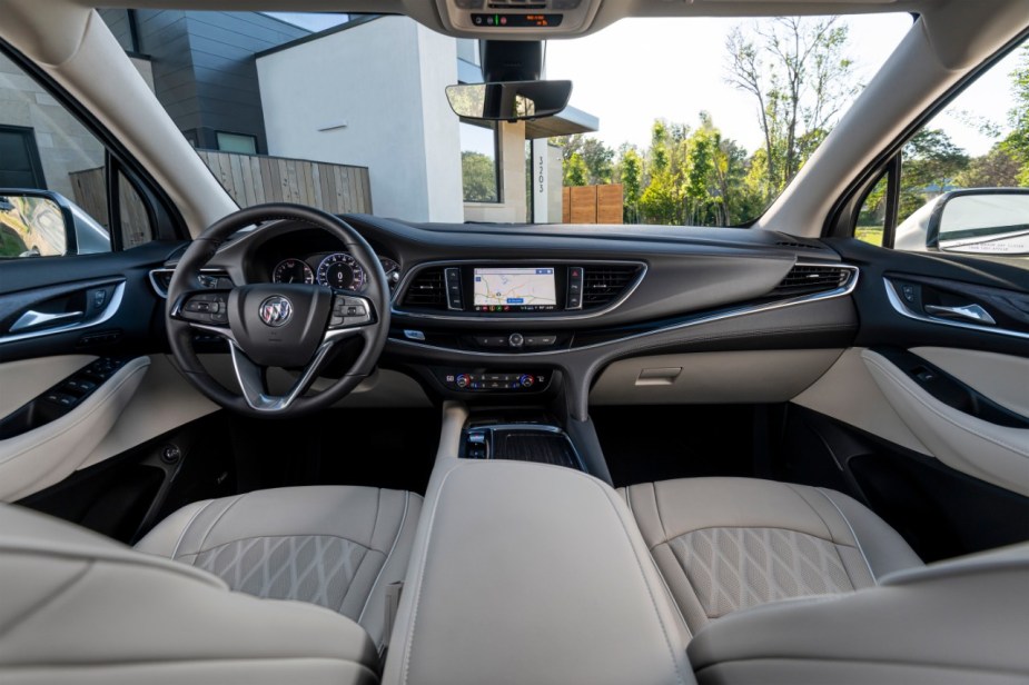 Dashboard and front seats in 2023 Buick Enclave, highlighting its release date and price