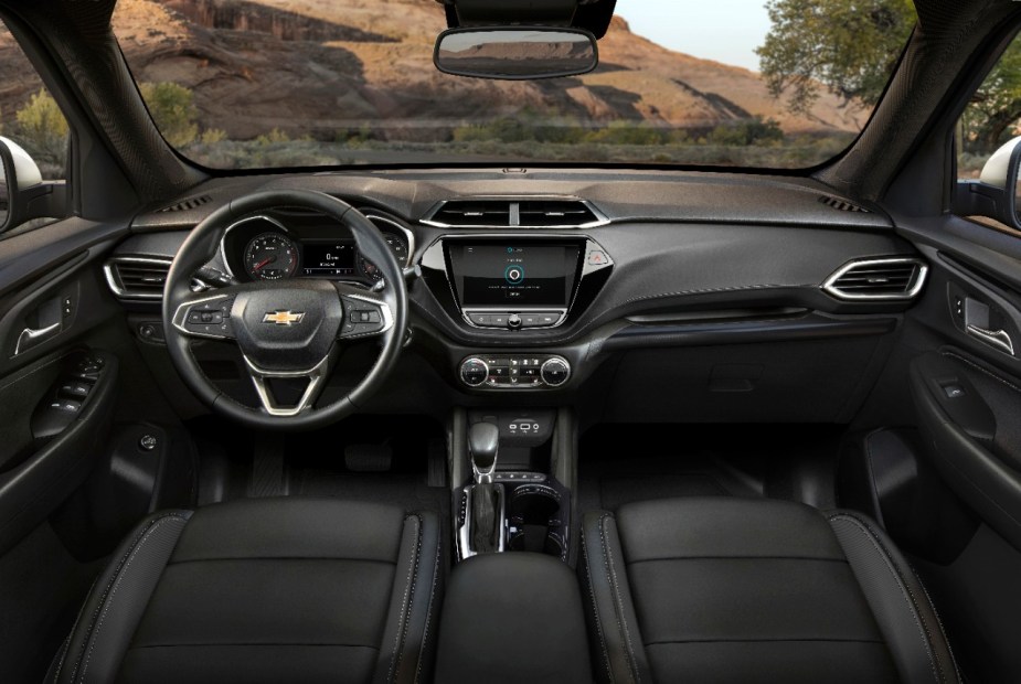 Dashboard and front seats of the 2023 Chevy Trailblazer, highlighting its release date and price