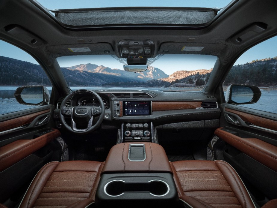 Dashboard and front seats in 2023 GMC Yukon Denali Ultimate, highlighting its release date and price
