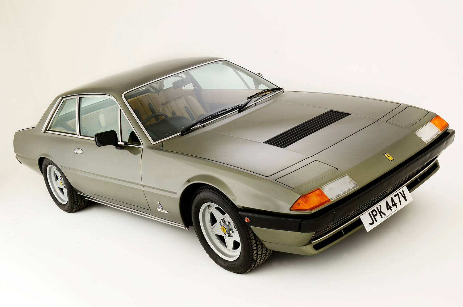 1980 Silver Ferrari 400i on white background photo shoot