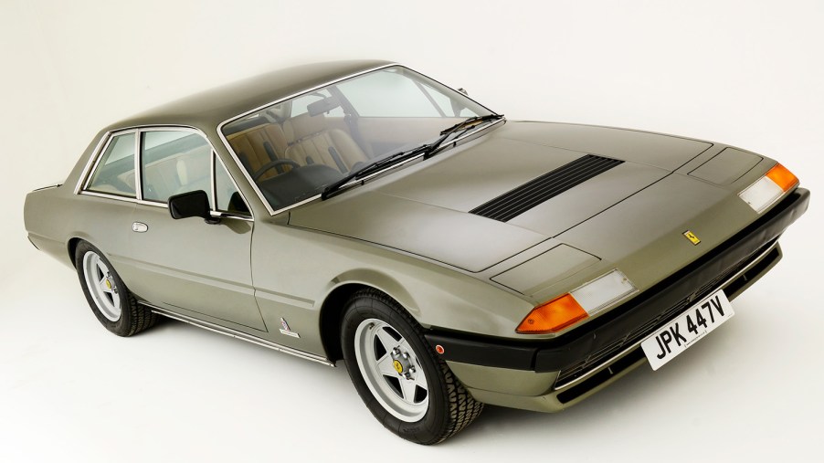 1980 Silver Ferrari 400i on white background photo shoot