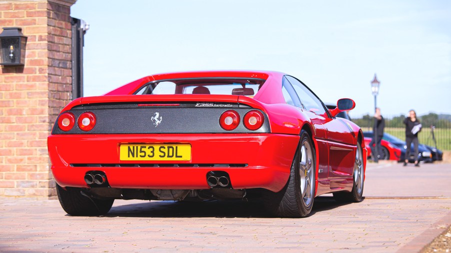 Red Ferrari F355 Berlinetta coupe in England much like the F355 challenge race car wrecked in neighborhood