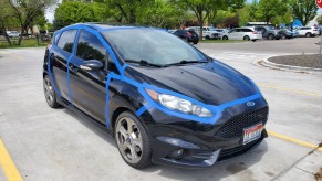 2016 Ford Fiesta ST covered in masking tape in an attempt to test fuel economy hacks for improving mpgs on road trip