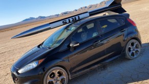2016 Ford Fiesta ST with a model rocket on top outside of Las Vegas, Nevada