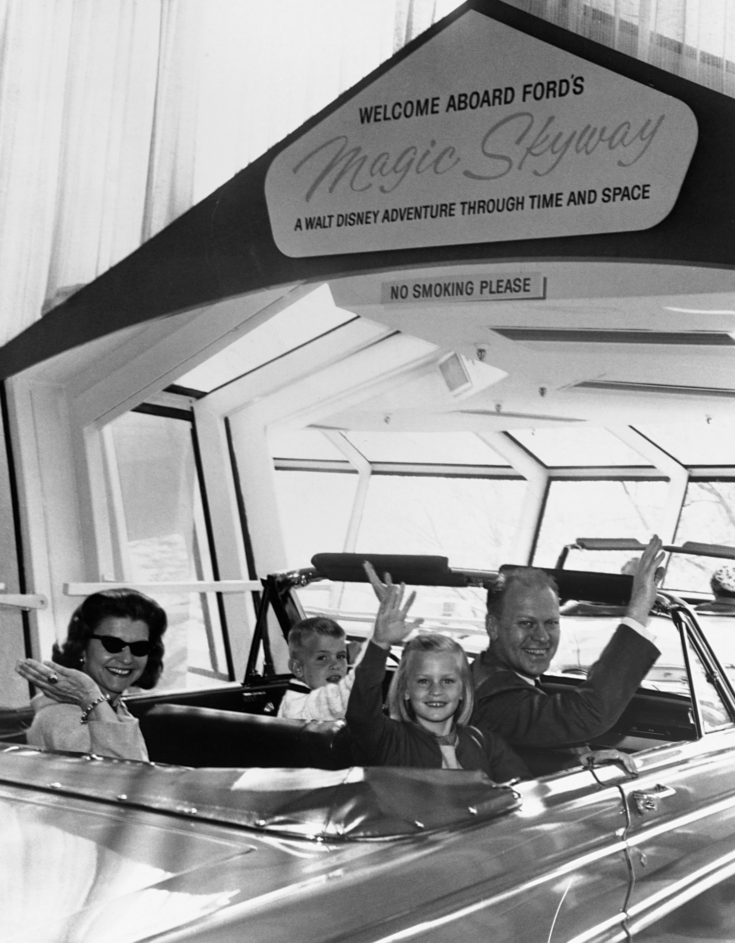 exhibitors riding the Ford and Walt Disney Magic Skyway in a Mustang at the 1964 World's Fair in New York City