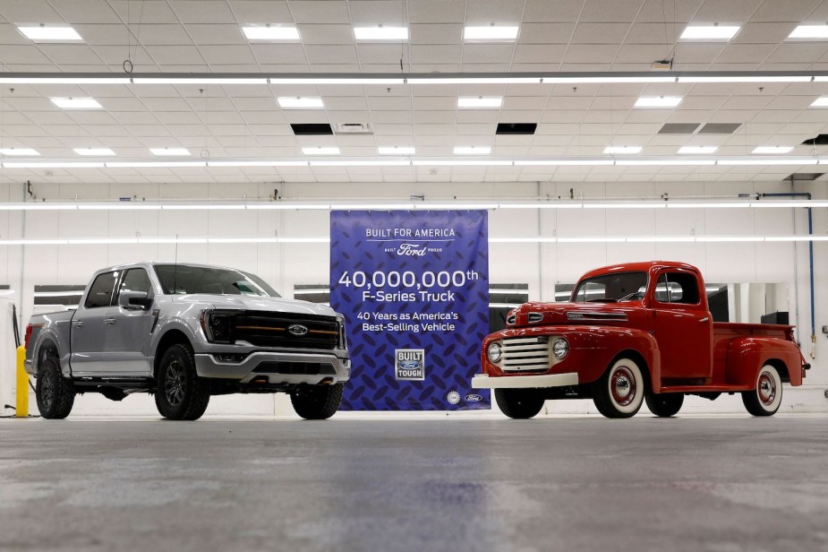 The 40 millionth Ford F-Series pickup truck parked next to a 1950 F-1 for a promo photo.