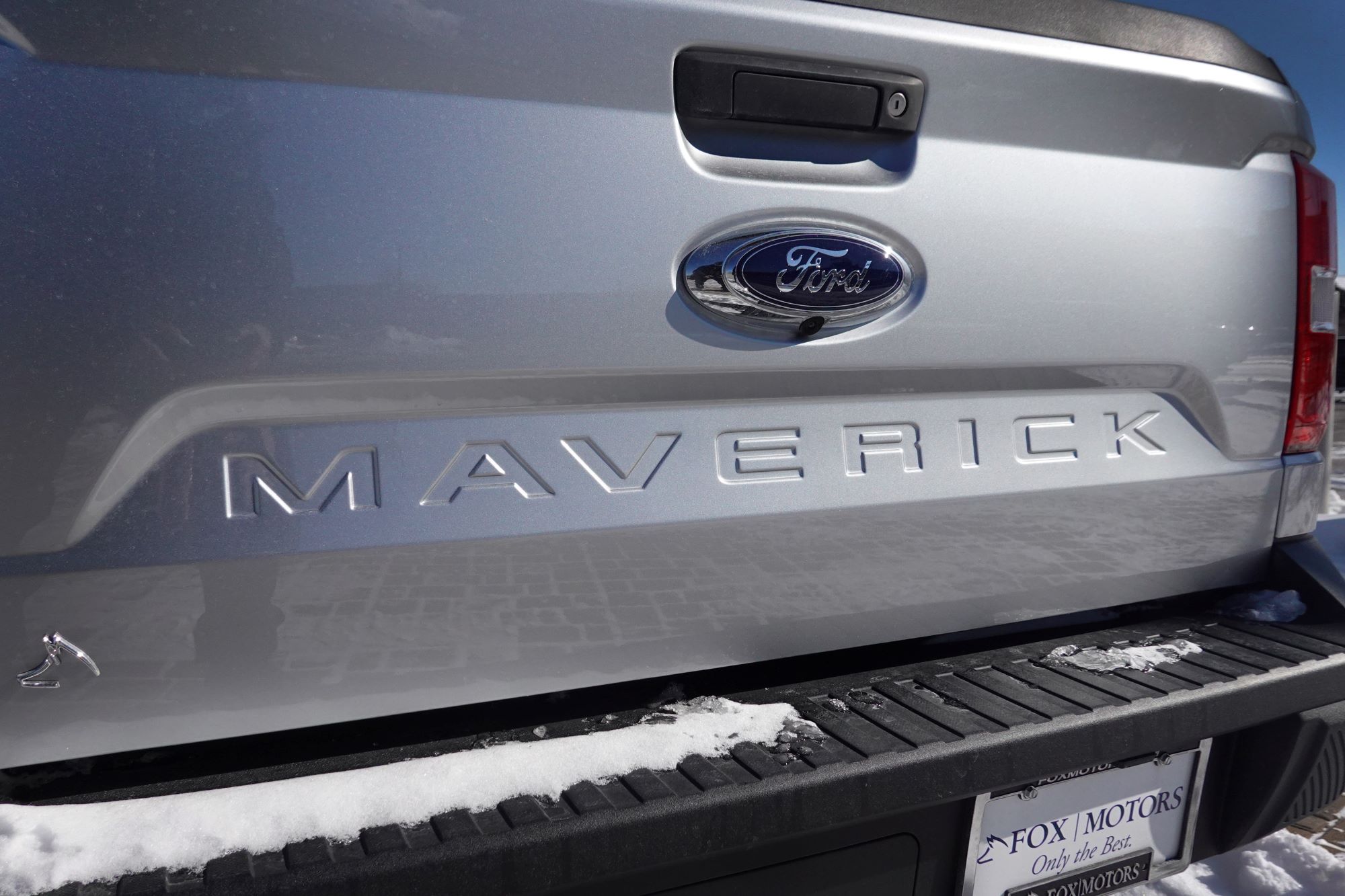 A silver back-end of a Ford Maverick, which is now the new Terminix truck as a Ford Maverick Hybrid.