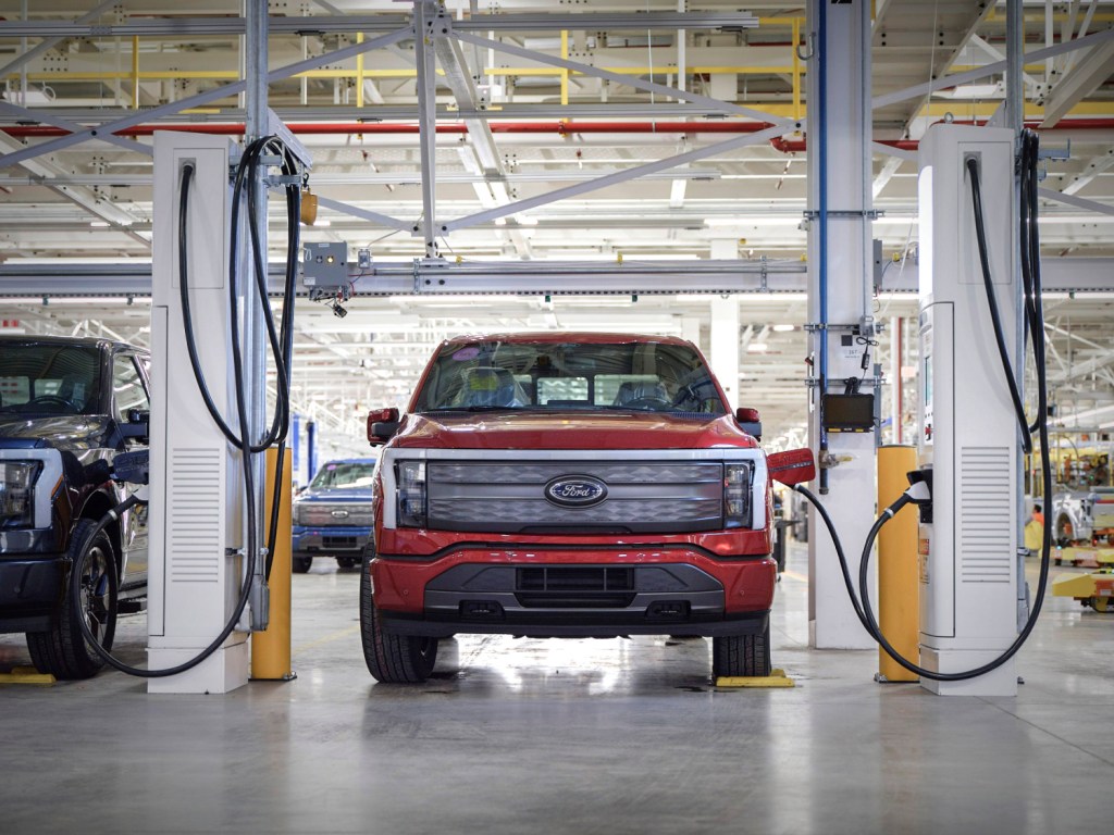 The Ford F-150 Lightning electric truck - our guide to electric vehicle range includes charging, road trips, distance, and more.