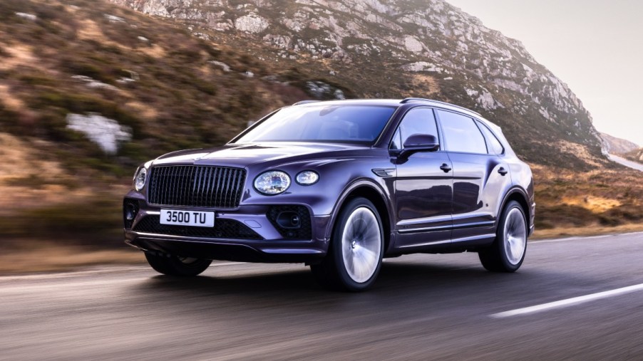Front angle view of blue 2023 Bentley Bentayga EWB (Extended Wheelbase), highlighting its release date and price
