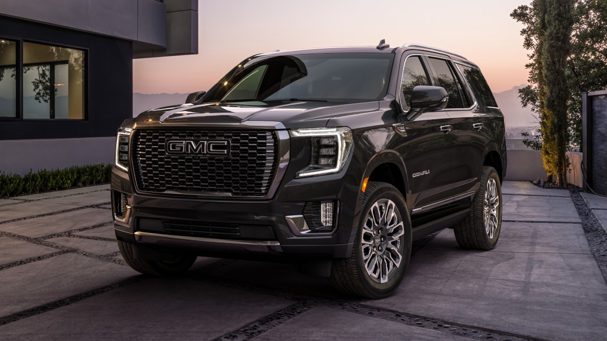 Front angle view of black 2023 GMC Yukon Denali Ultimate, highlighting its release date and price