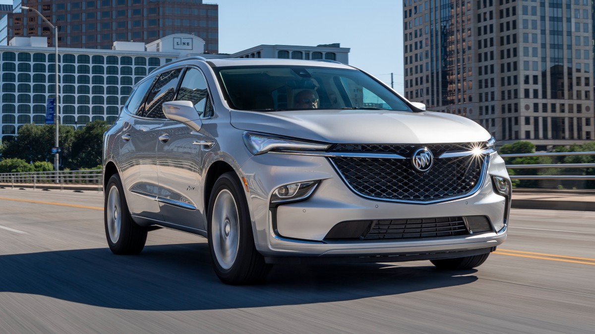 Front angle view of silver 2023 Buick Enclave, highlighting its release date and price