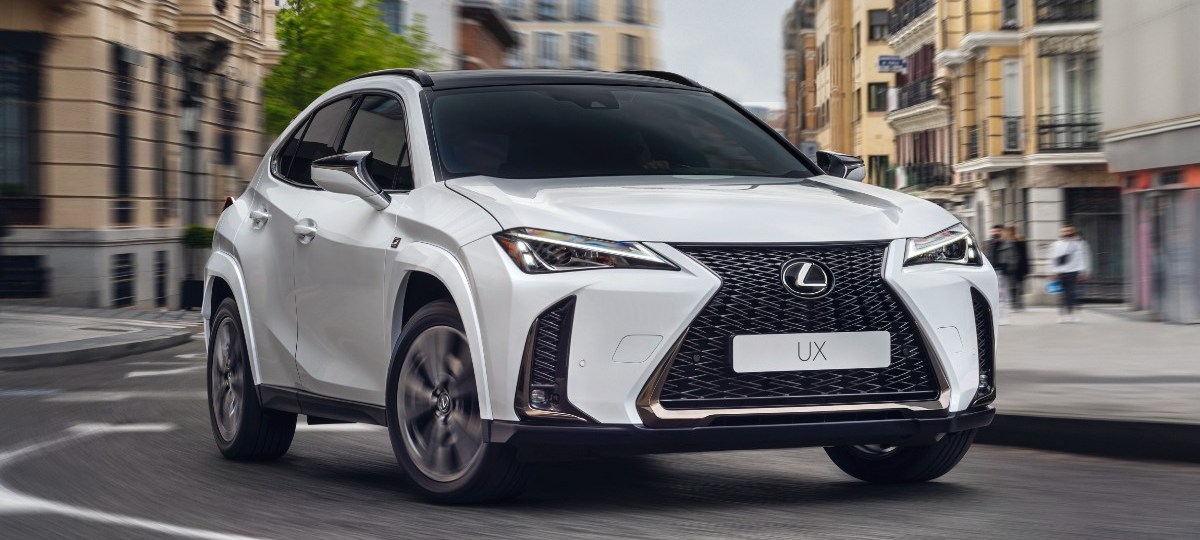 Front angle view of white 2023 Lexus UX, highlighting its release date and price