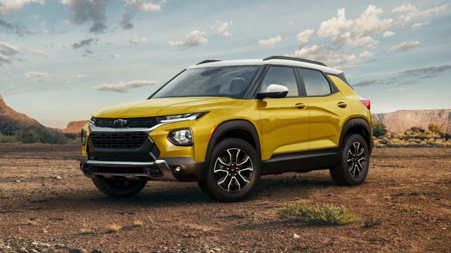 Front angle view of yellow 2023 Chevy Trailblazer, highlighting its release date and price