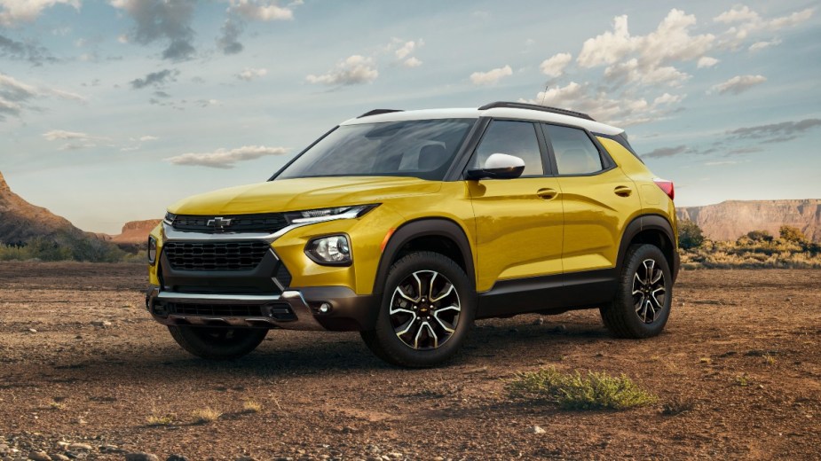 Front angle view of the yellow 2023 Chevy Trailblazer, highlighting its release date and price