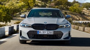 Front view of gray 2023 BMW 3 Series, highlighting its release date and price