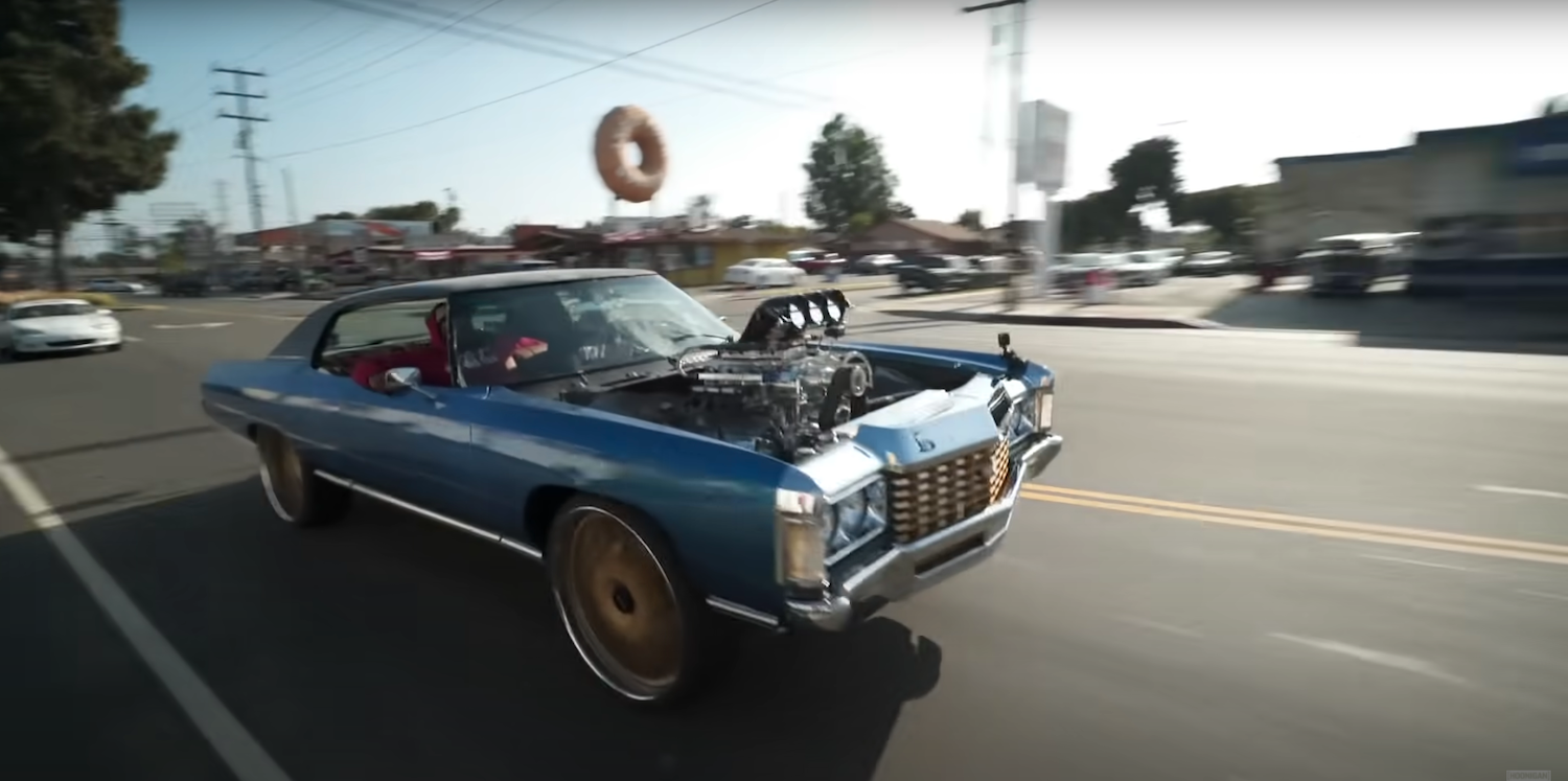 1971 Chevy Caprice donk car cruising through downtown Los Angeles