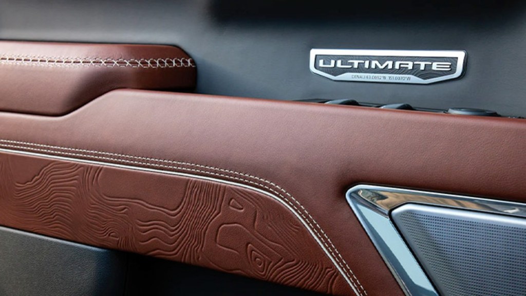 Interior Materials GMC Sierra with the Mt. Denali topographical map in the leather.