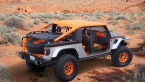 Shortened Jeep Gladiator concept truck with orange convertible roof.