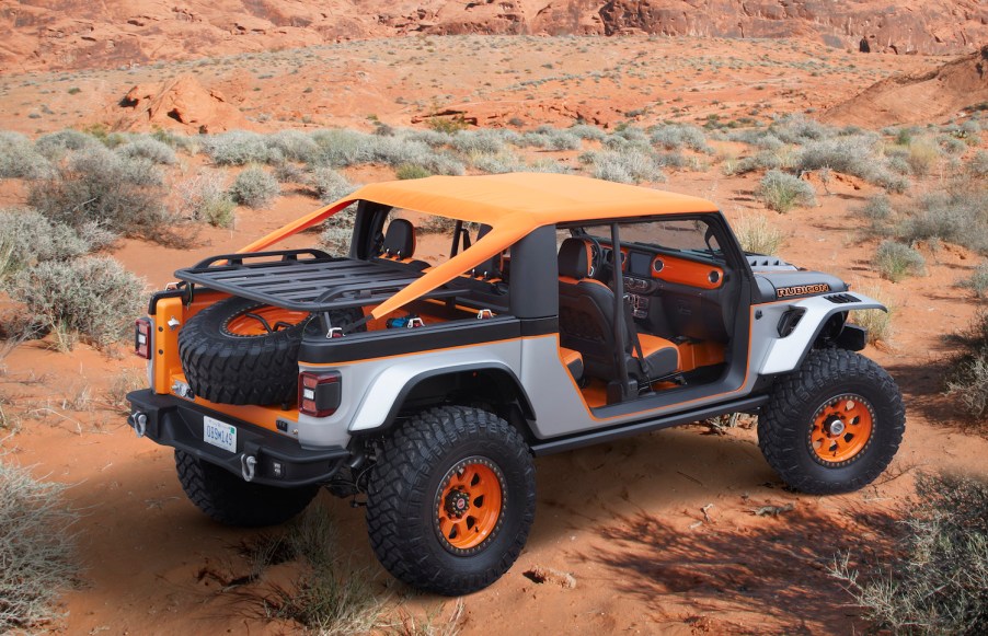 Shortened Jeep Gladiator concept truck with orange convertible roof.