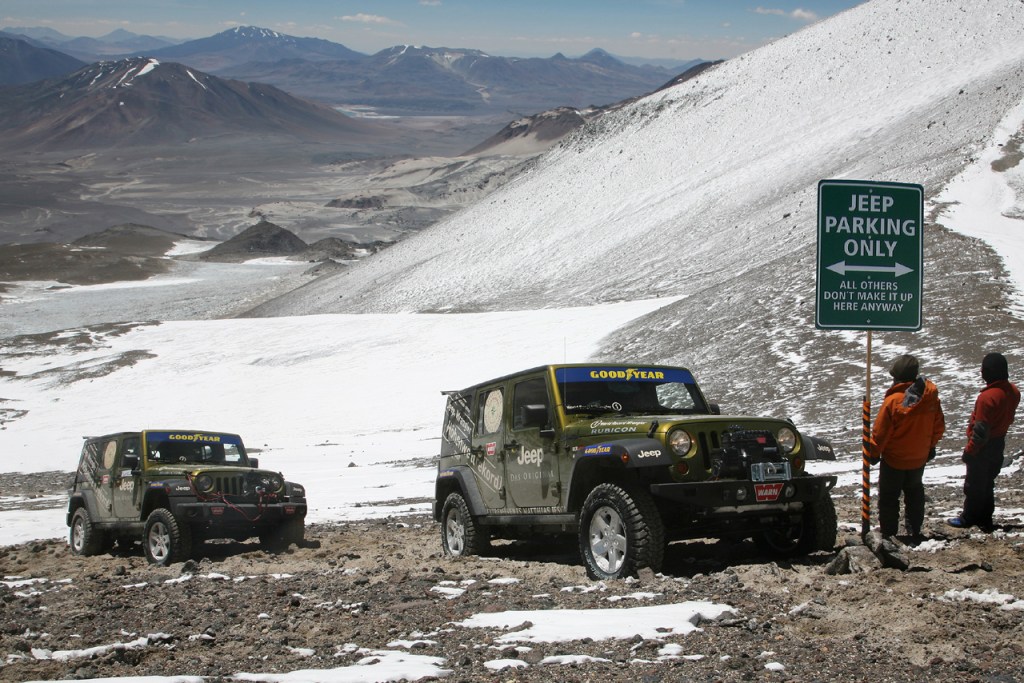 Two 2007 Jeep Wrangler Rubicons parked on the slops of a Volcano in Chile after setting an altitude record.