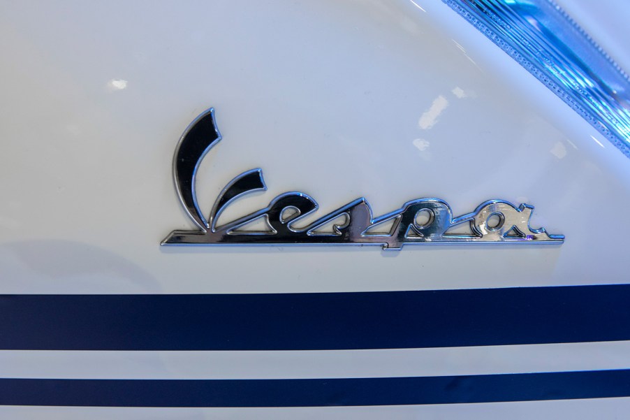 closeup of white Vespa sprint logo much like the model Justin Bieber collaborated on
