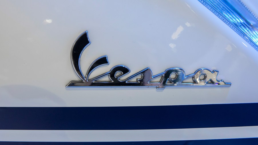 closeup of white Vespa sprint logo much like the model Justin Bieber collaborated on