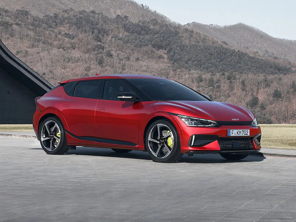 A red 2022 Kia EV6 GT shows off its unique styling as a performance EV crossover.