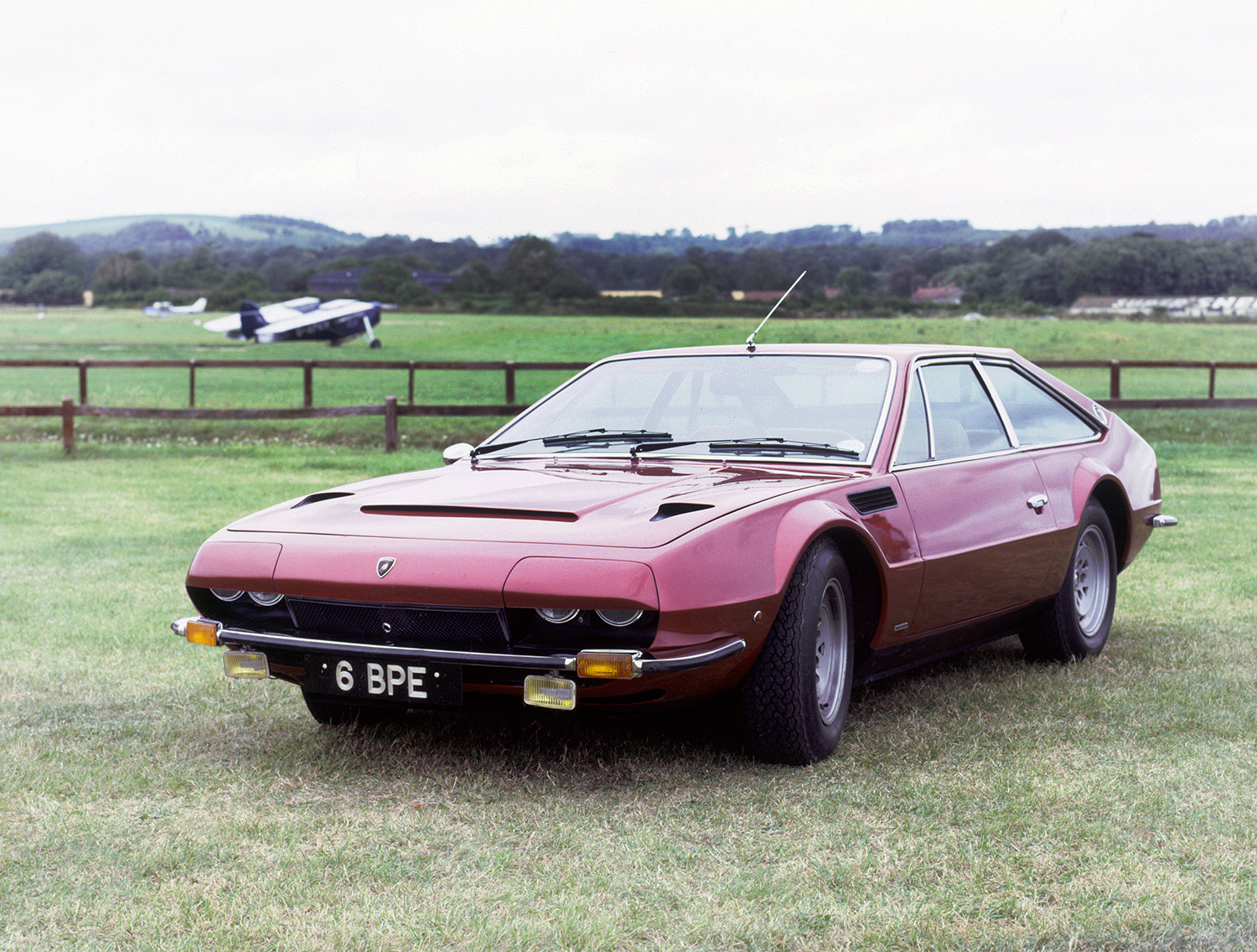 Classic 1973 Lamborghini Jarama model sitting in a grass field