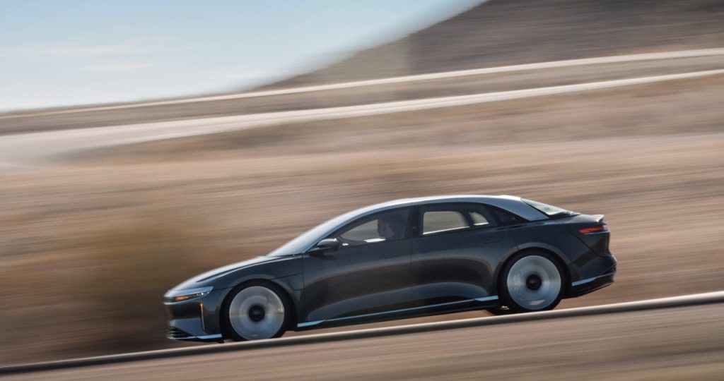 a 2022 lucid air grand touring performance tackles a country road showing off its electric performance