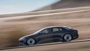 a 2022 lucid air grand touring performance tackles a country road
