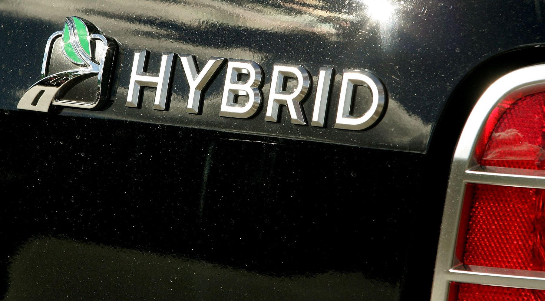 A Hybrid badge on a 2006 Mercury Mariner Hybrid SUV model