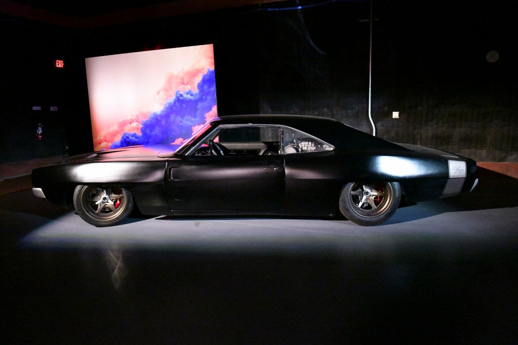 This crazy custom mid-engine Dodge Charger is a movie build with lots of horsepower.