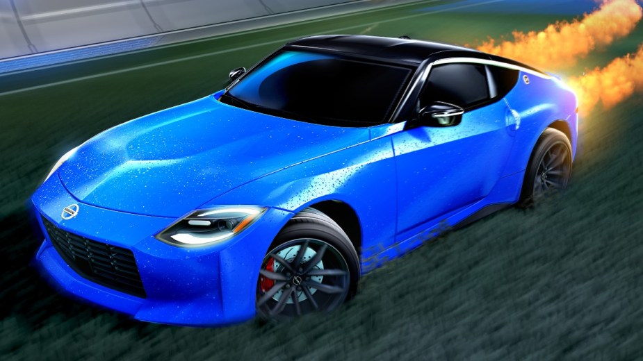 the blue 2023 nissan z rendered in rocket league with flame coming from the rear
