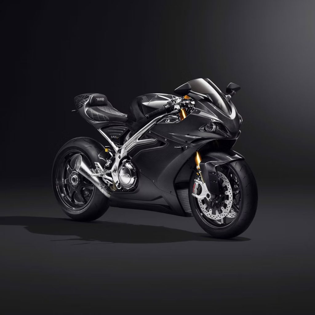 A carbon-fiber Norton V4SV Carbon motorcycle in a black studio