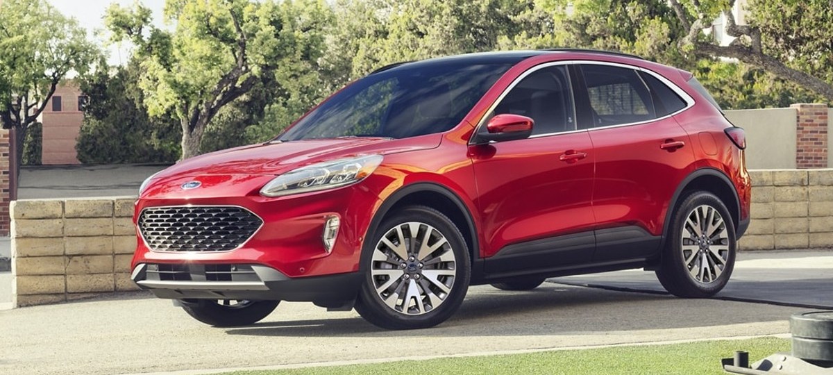 Rapid Red 2022 Ford Escape parked outside of a garage