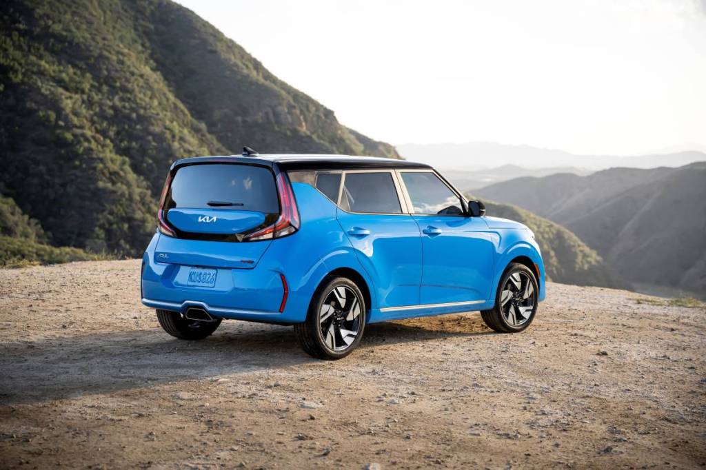 Rear angle view of blue 2023 Kia Soul, highlighting its release date and price