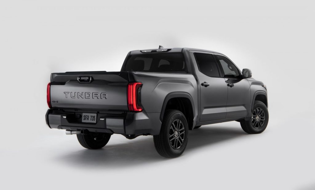Rear angle view of dark gray 2023 Toyota Tundra, highlighting its release date and price
