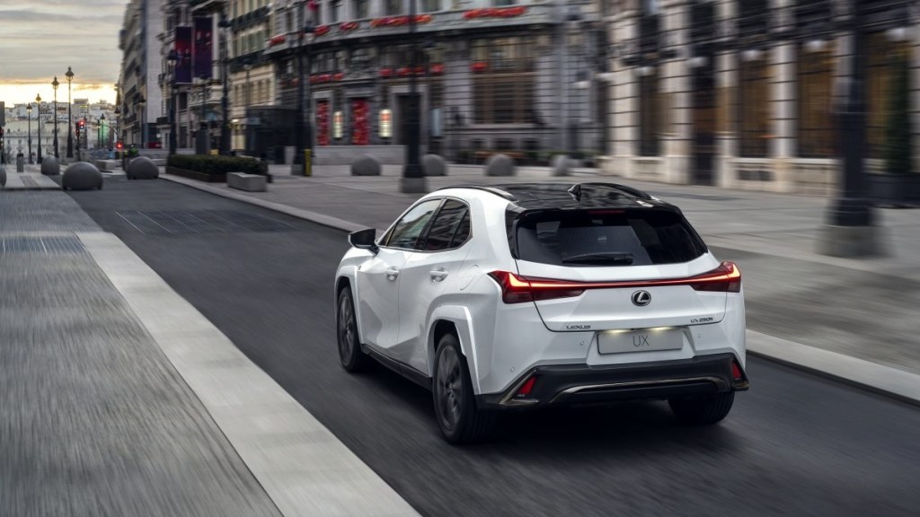 Rear angle view of white 2023 Lexus UX, highlighting its release date and price