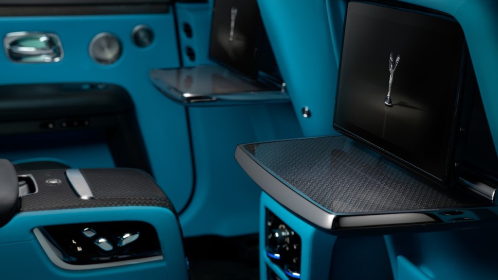 the beautiful blue interior of a new rolls royce ghost