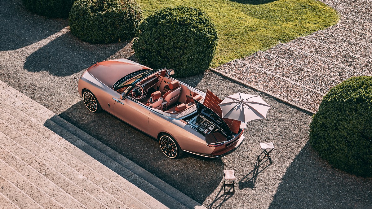 the rear end of the rolls-royce boat tail is a perfect picnic spot for a billionaire