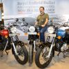 Royal Enfield Global Head of Brand Shubhranshu Singh posed with Bullet motorcycle models in Amritsar, India