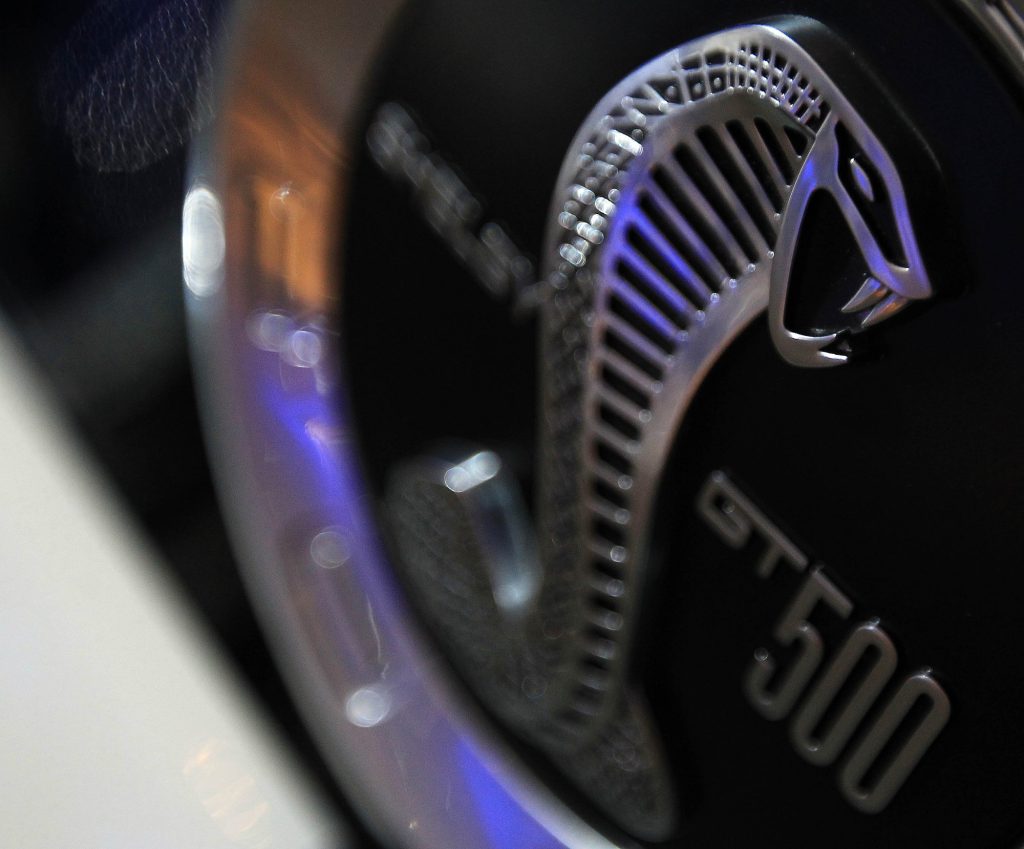 This Ford Mustang Shebly GT500 badge is on an S197