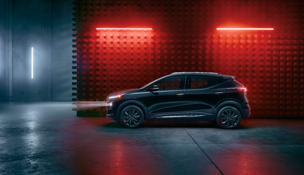 Side view of black 2023 Chevy Bolt EUV, highlighting its release date and price